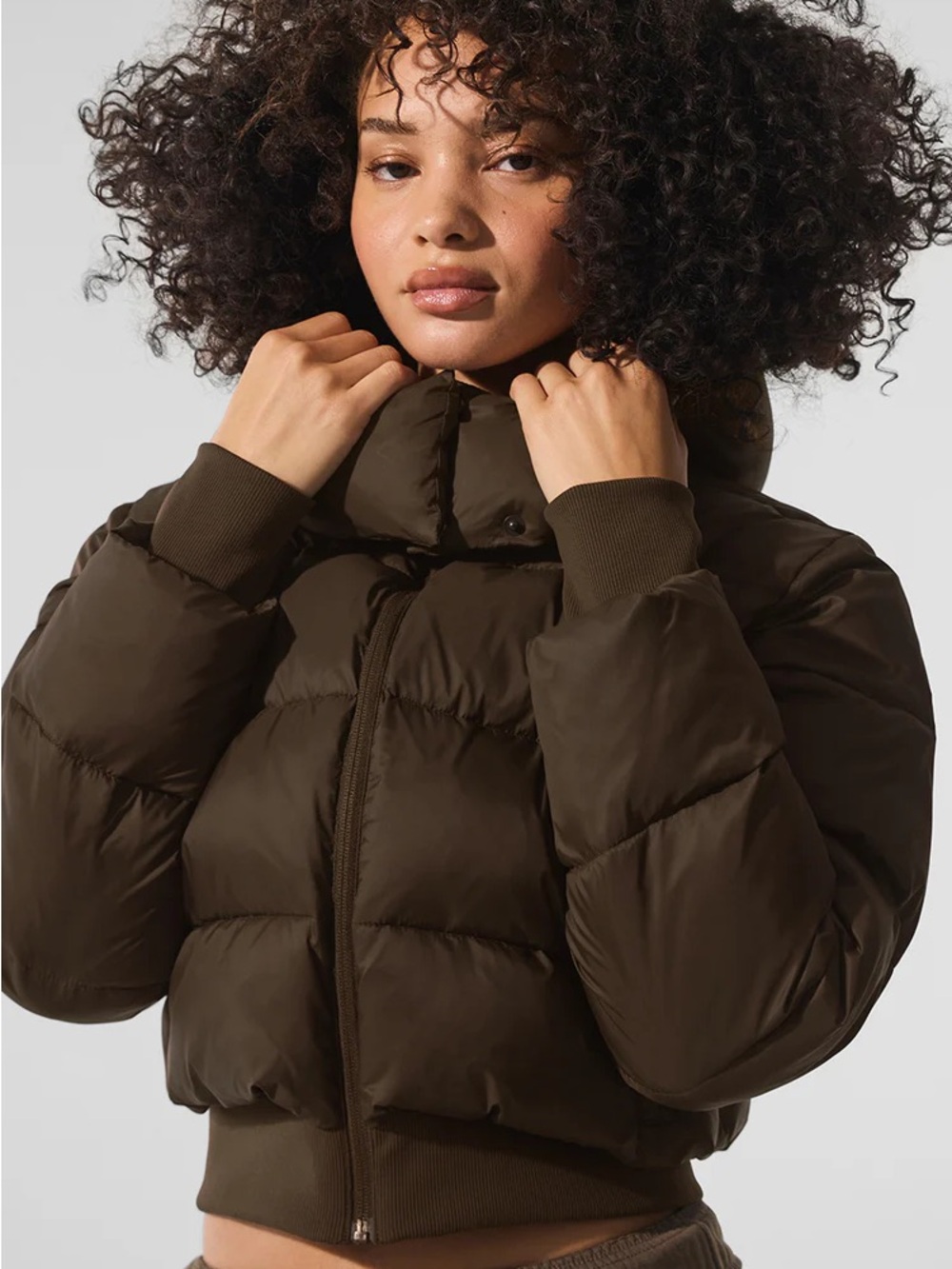 ALO Yoga Cropped Hooded Puffer Jacket in Dark Brown - Picture 2 of 3